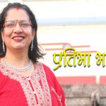 गुलावी बुट्टे साडी